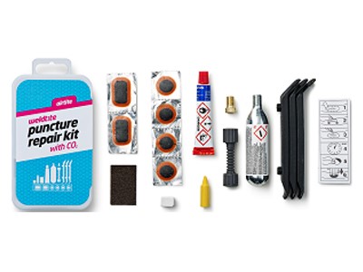 Zestaw łatek do dętek WELDTITE Airtite Puncture Kit with CO2 (6x Łatka + Klej + Papier ścierny + Kreda + Kredka + 3x Łyżka + Nabój CO2 + Adapter zaworu) (NEW).